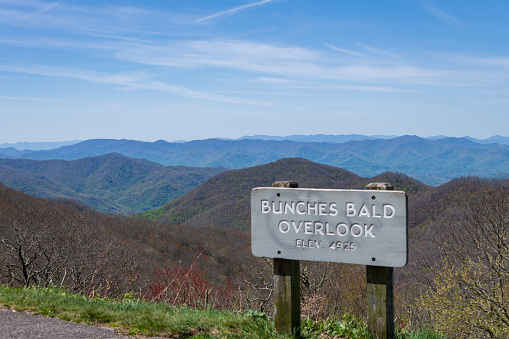 View from the Bunches Bald Overlook on the Blue Ridge Parkway North Carolina. Signage in the foreground, valley below