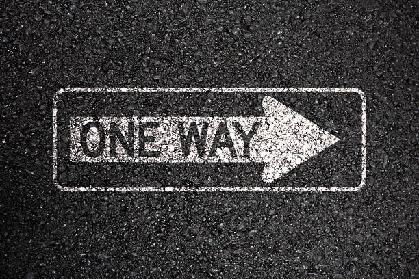 One way One way on the asphalt. one way stock pictures, royalty-free photos & images