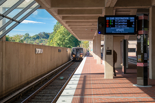Metro train entering the West Falls Church station on the DC Orange line