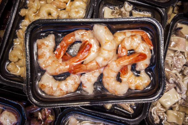 istock Shrimp tails in vacuum trays sealed 1788194675