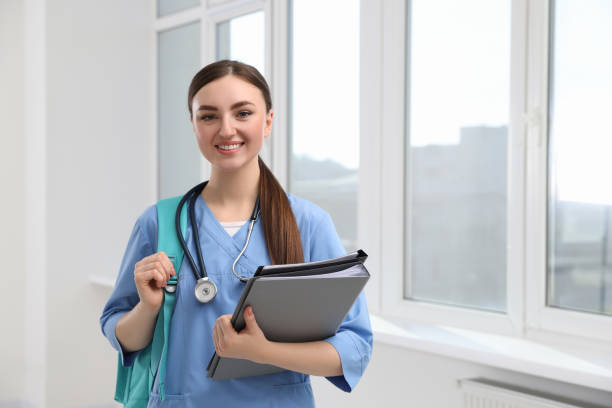 istock Smart medical student with folders in college hallway, space for text 1788200971