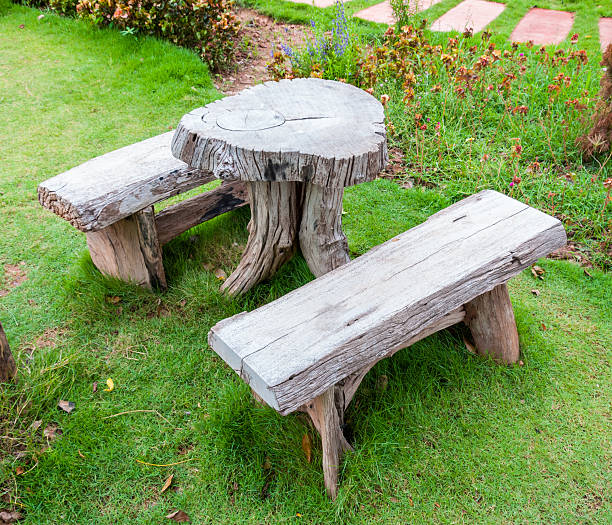istock The empty wooden table and bench in garden or park 178820850