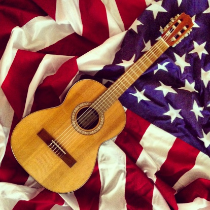 Acoustic guitar on the US Flag / Mobilestock photo, photographed with iPhone 5