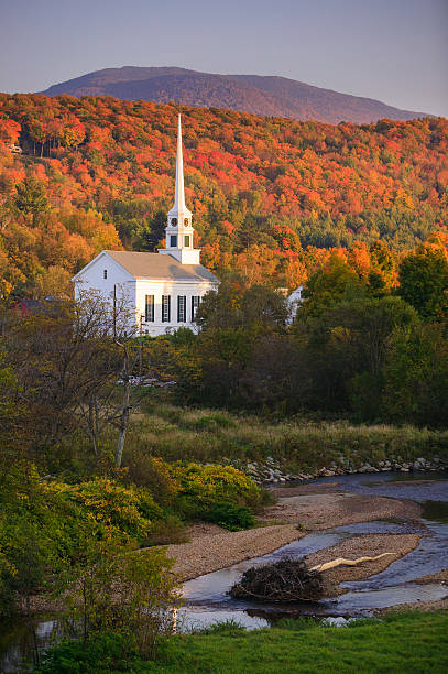 istock Fall foliage behind a rural Vermont church 178824996