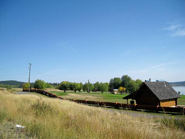 istock Log fence and cabin 178825060