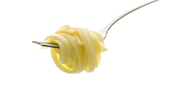 Spaghetti on a fork. Isolated on a white background.