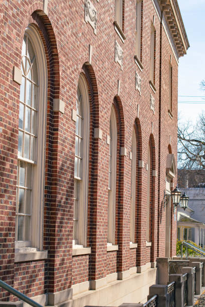 istock Old fashion brick building arch windows , copy space background. 1788256368