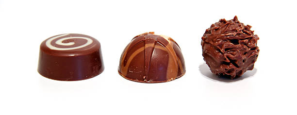 istock Trio of luxury milk chocolates lined up isolated 178825729