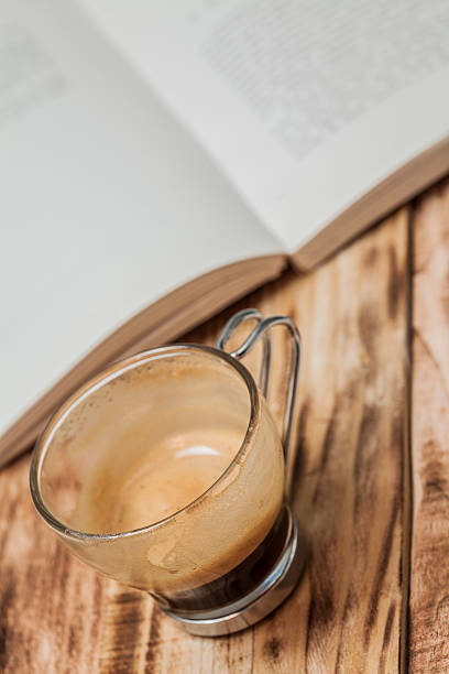 istock Cup of coffee and book 178826070