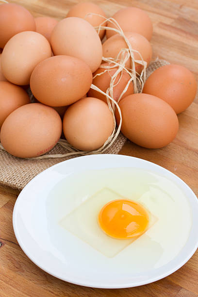 istock pile of  eggs and broken one 178826750