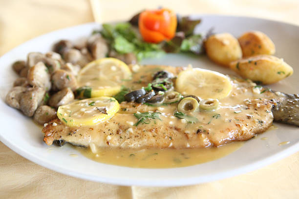 istock trout fish with lemon sauce 178827470