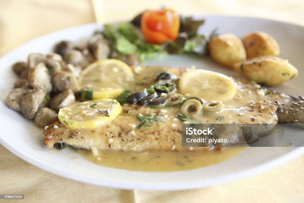 trout fish with lemon sauce Close-up Stock Photo