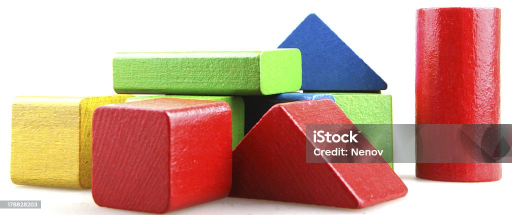 Wooden building blocks Building from wooden colourful childrens blocks Achievement Stock Photo