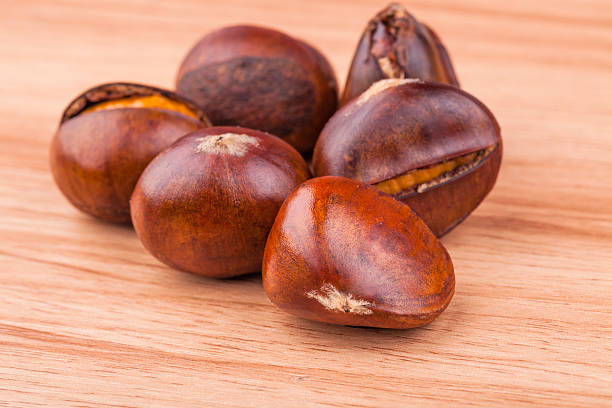 azúcar castaña asada - chestnut sweet food yellow group of objects fotografías e imágenes de stock