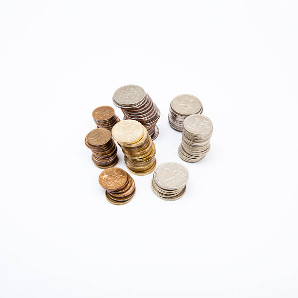 Coins on the white background stock photo
