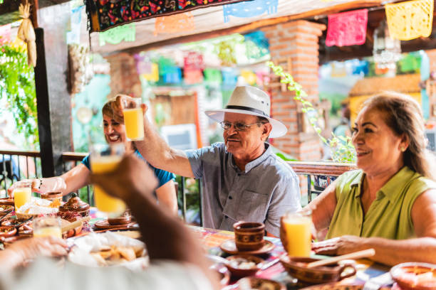 istock Senior friends doing a celebratory toast 1788290441