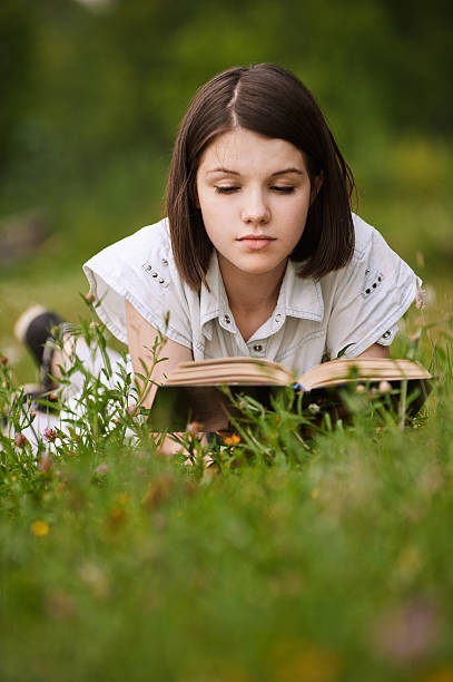 istock young beautiful grand woman reading book 178830209