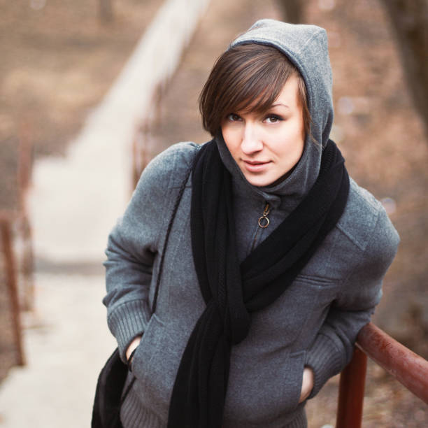 portrait of a beautiful brunette in autumn stock photo