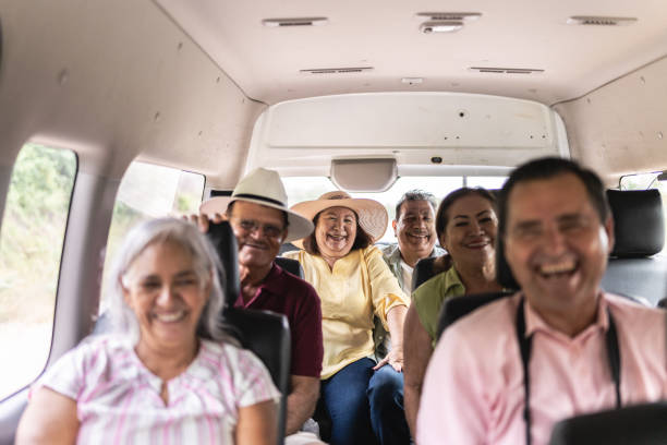 istock Senior tourists having fun and laughing in a van 1788329884
