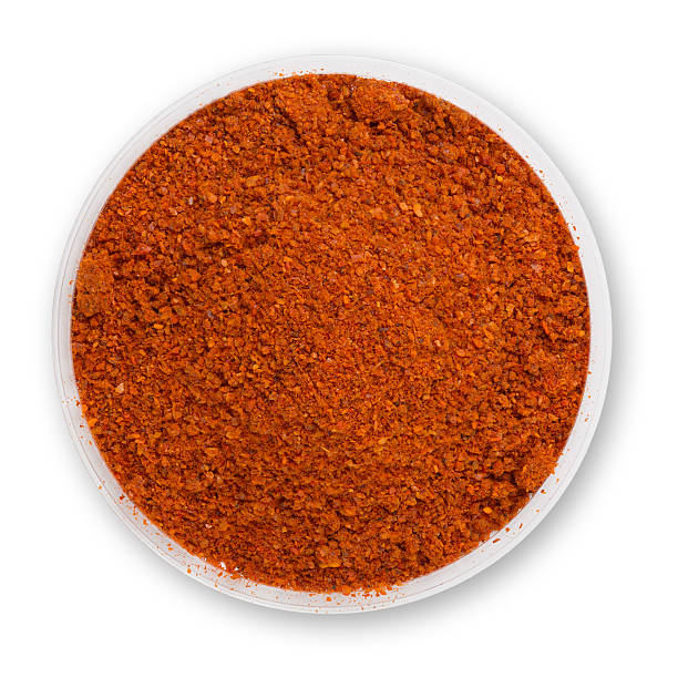 Heap ground paprika isolated on white background stock photo