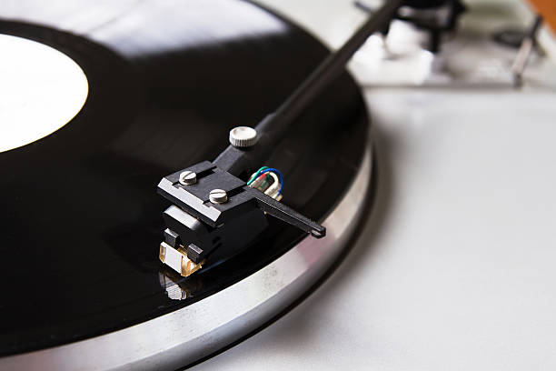 istock Turntable playing vinyl record with music 178837564