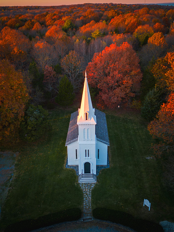 Aerial, autumn shot of South Ferry Church in Narragansett, Rhode Island.