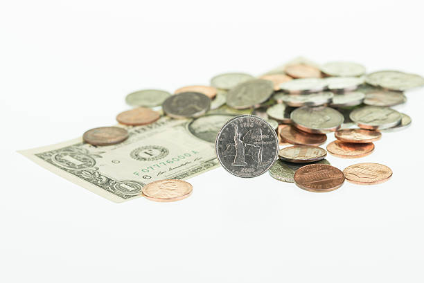 istock New York State Quarter with dollar and coins 178838320