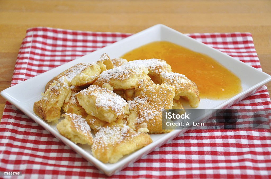 Kaiserschmarrn - German pancakes Kaiserschmarrn - German pancakes with applesauce Raisin Stock Photo
