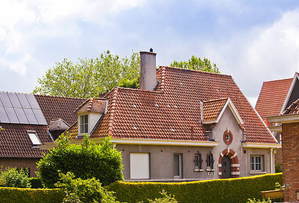 two white gables with window and video surveillance