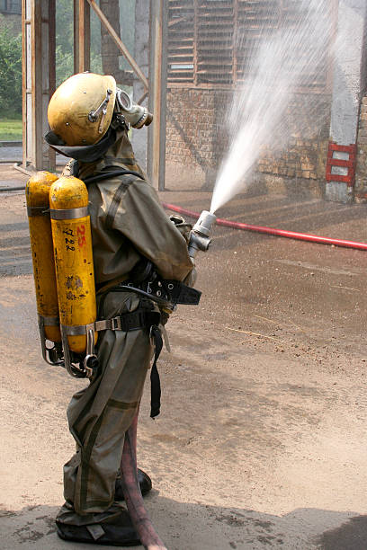 istock firefighters in chemical protection suit 178839704