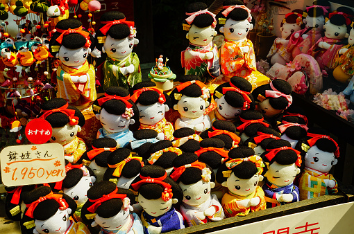 Traditional Japanese wooden kokeshi dolls sold as souvenir