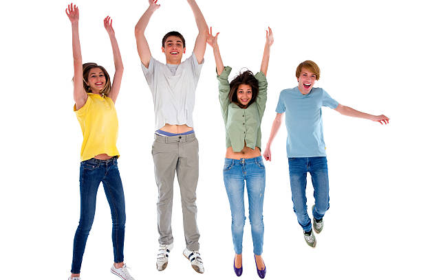 istock group of teenagers jumping 178840778