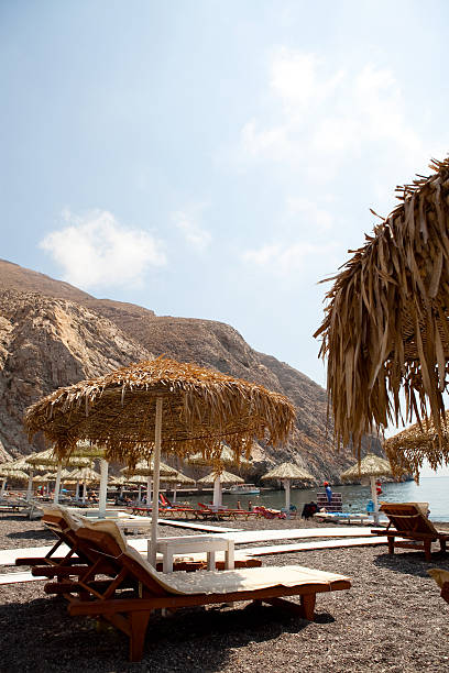 istock Sunbeds in Perissa, Santorini, Greece 178841057