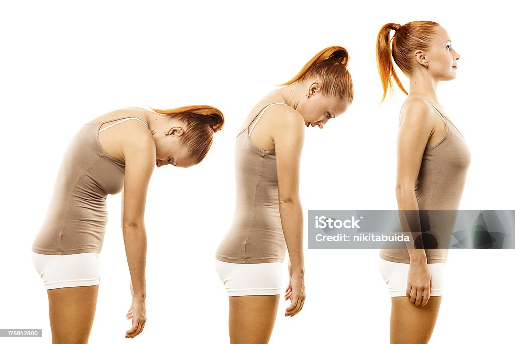 Young woman practicing yoga spine roll Young woman practicing yoga spine roll over white background Adult Stock Photo