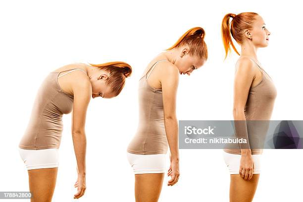 Young Woman Practicing Yoga Spine Roll Stock Photo - Download Image Now - Adult, Beautiful People, Beauty