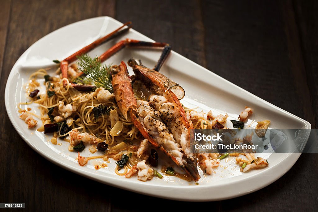 Pasta con aragosta, salsa all'aglio - Foto stock royalty-free di Aragosta - Frutto di mare