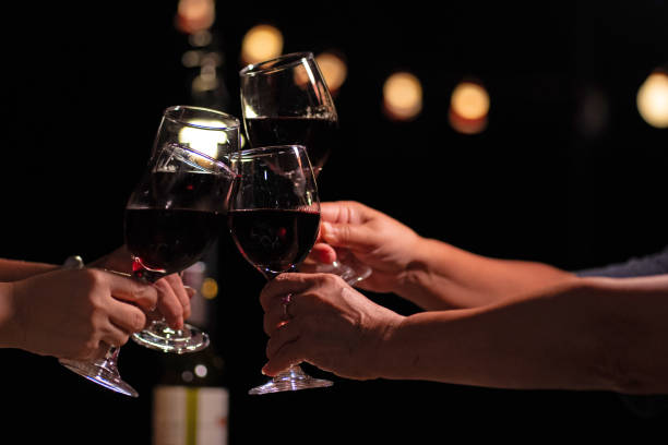 istock Friends clinking wine glasses 1788433140