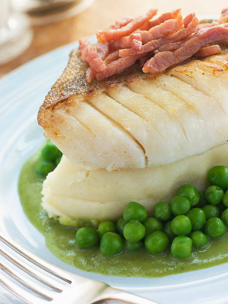 istock Roasted Cod Fillet with Mash Potato Peas and bacon 178843906