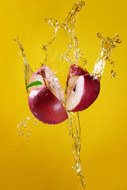 Apple on water splash stock photo