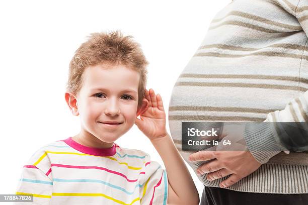 Curious Child Boy Listening His Pregnant Mother Abdomen Stock Photo - Download Image Now