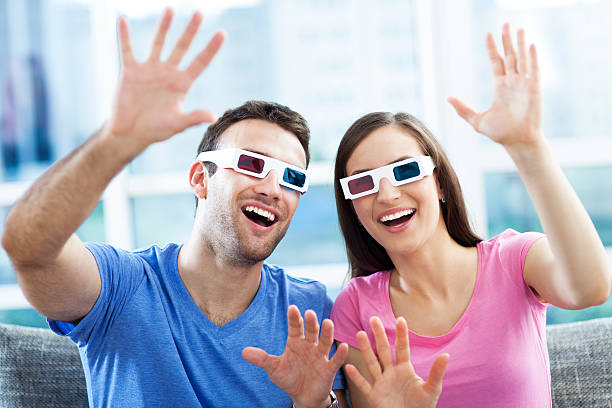 istock Couple wearing 3d glasses 178848877