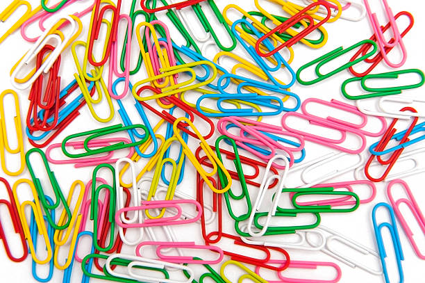 paperclips - couplers fotografías e imágenes de stock