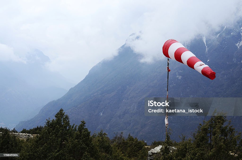 Meteorological red white windsock in Himalaya airport,Nepal Wind Stock Photo
