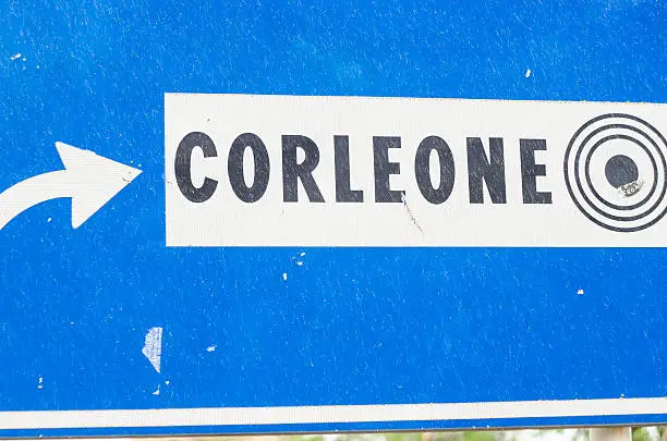 "Road sign Corleone - famous town of mafia, in Sicily, Italy"