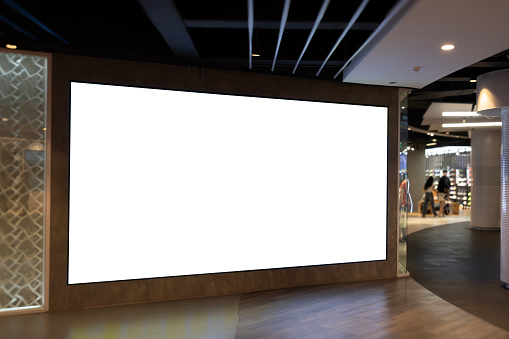 mockup of large led screen a front of shop in shopping mall.