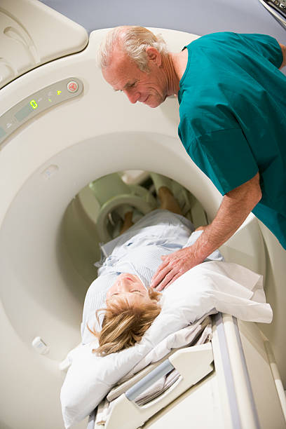 istock Doctor With Patient Prepare For A Computerized Axial Tomography 178850198
