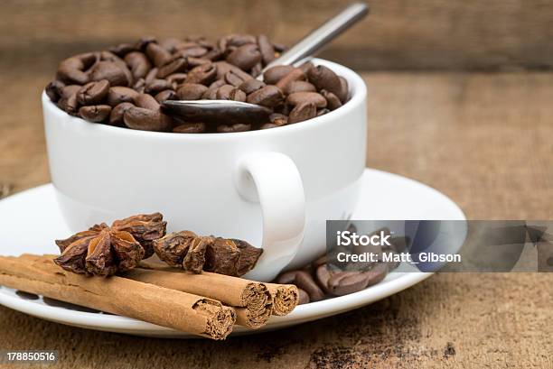 Cup Of Coffee And Beans On Wooden Background Stock Photo - Download Image Now - Africa, Arabia, Backgrounds