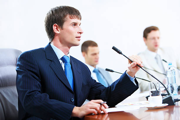 istock Three businesspeople at meeting 178850733