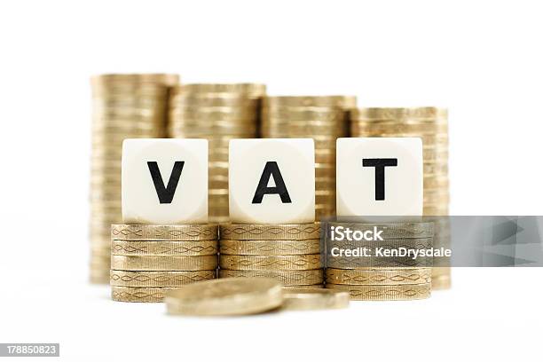 Vat On Stacked Coins With White Background Stock Photo - Download Image Now
