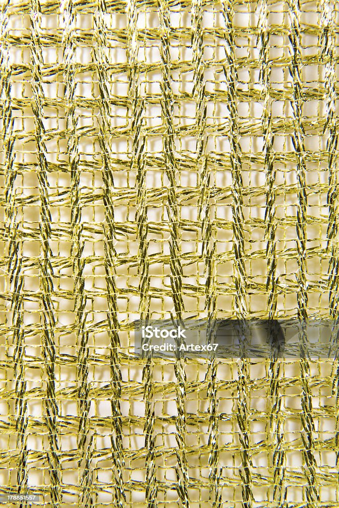 Oro ampio nastro trecce su sfondo bianco - Foto stock royalty-free di Close-up